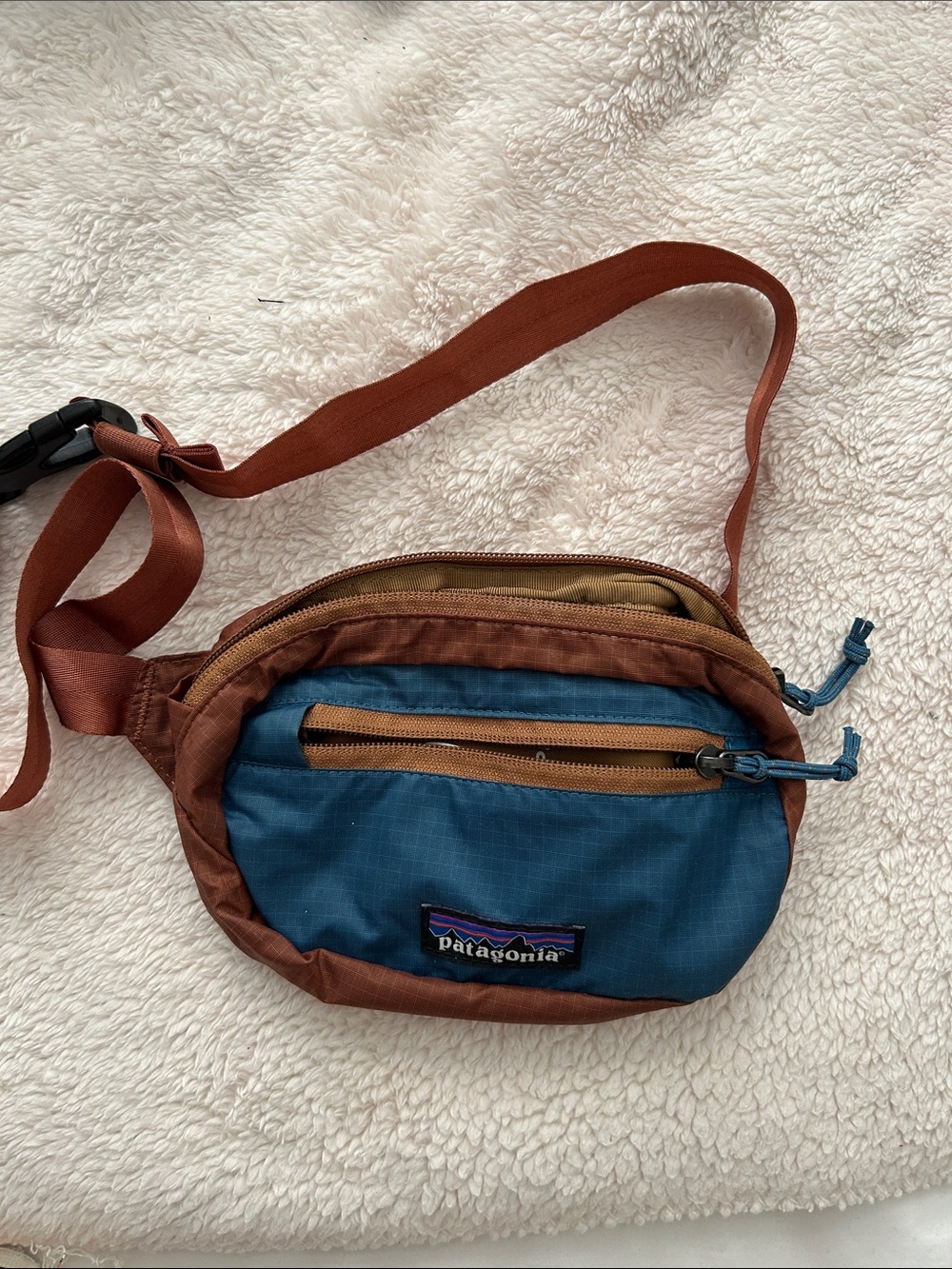 Patagonia Blue and Brown Hip Pack with Rust Strap